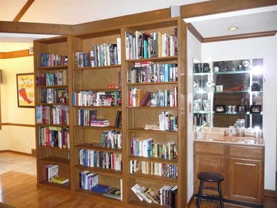 Custom built-in bookcases and wet bar.