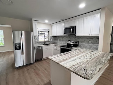 7020 Wentworth Way, New Port Richey, FL 34655 - photo 3