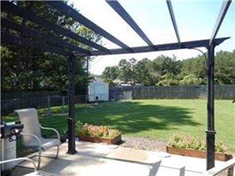 Huge fenced backyard with patio, side patio, pergo