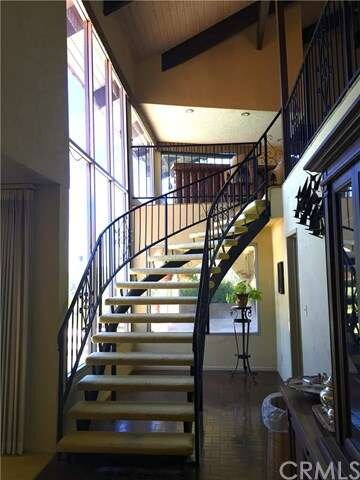 One sexy staircaseâ€¦to the Rat Pack Bar and Famil