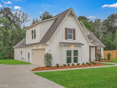 Modern farmhouse featuring board and batten siding