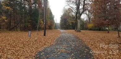 Long winding paved drive to the 10 acre property - follow me for a tour of this fabulous property 
