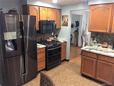 View from kitchen into dining-living room combo