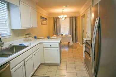 Kitchen featuring stainless steel appliances, crow