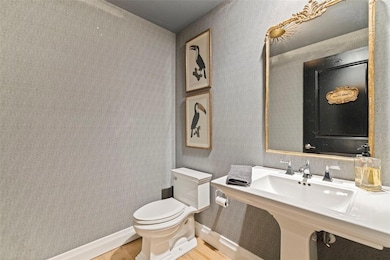 Elegant powder bath near the dining room.