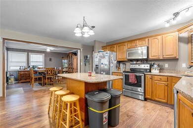 kitchen with dining room in background