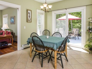 The kitchen table looks out to the...