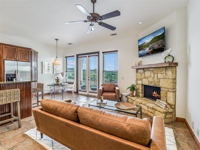 Living room with a fireplace, baseboards, ceiling