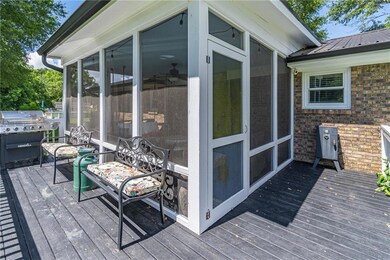 Wooden terrace with a sunroom