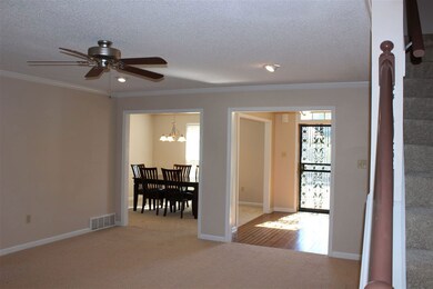 With view of entry and dining room.