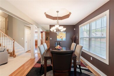 Formal dining and staircase to upper level. There 