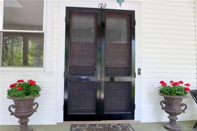 Original door and screen door.