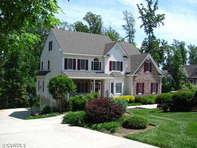 Exterior Front - Double width circle concrete driv