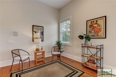 12 foot ceilings and wood floors throughout