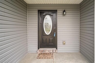 Stylish door and covered porch!