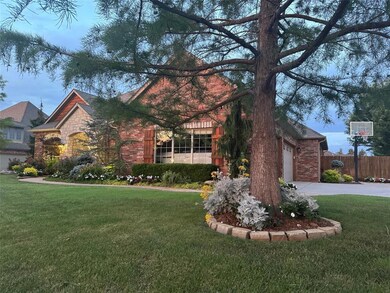 View of front of property featuring a garage and a
