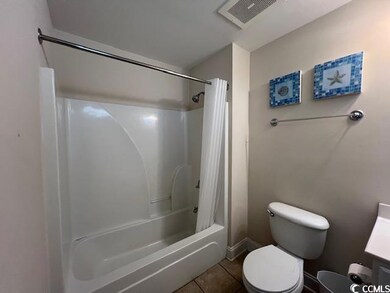 Full bathroom with vanity, toilet, shower / tub co