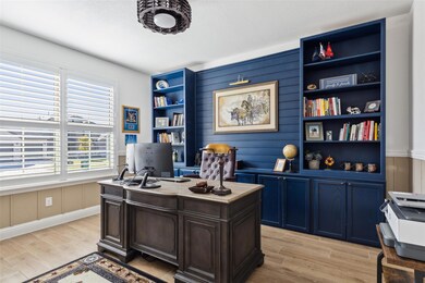 Office space featuring light wood-style flooring