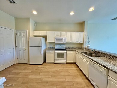 909 Hampton Cir unit 101, Naples, FL 34105 - photo 3