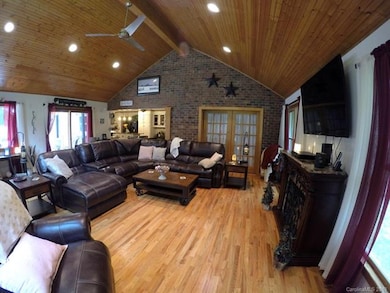 Looking across living room toward the kitchen.