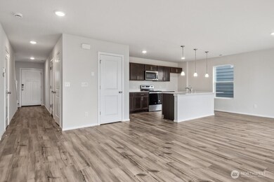 Photos are from the Lina model home in prior community. Finishes, upgrades, and features will vary.