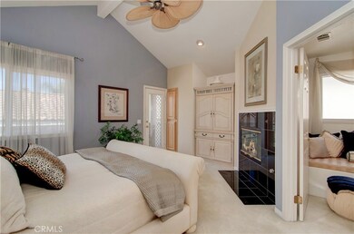 Private master suite has it all...fireplace, balcony, vaulted ceiling and room for king size bed...what a great place to end the day!