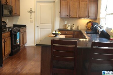 Wonderfully sized kitchen features granite counter