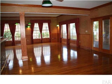 LIVING ROOM OFF FOYER IS ADAPTABLE FOR OTHER USES