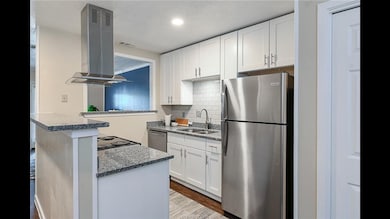 Kitchen laden with stainless steel appliances