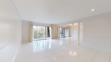 Another view of the bright living area features la
