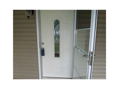 Front Exterior. New doors.