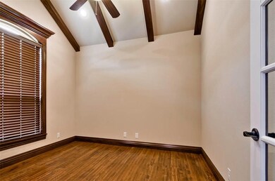 This gorgeous perfectly sized office sits to the l