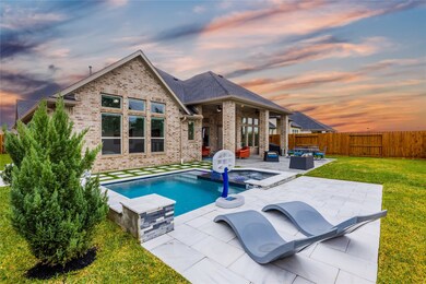 Come and see this spacious backyard with its beautiful covered patio and pool with spa. There is plenty of room for the kids to play and adults to relax! Perfect for your outdoor living space, patio furniture, bbq pit, and so much more. The possibilities are endless!