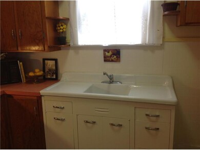 Kitchen. Brightly lit kitchen with...
