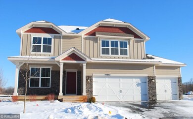 Envision sitting on this spacious front porch and 