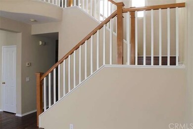 The wood covered stairs are a lovely upgrade to th