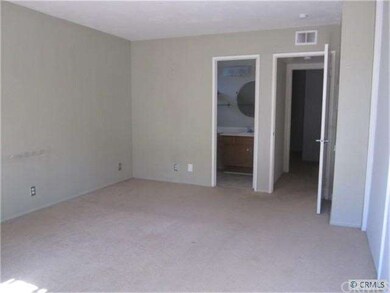 Master bedroom with walk in closet & private bath