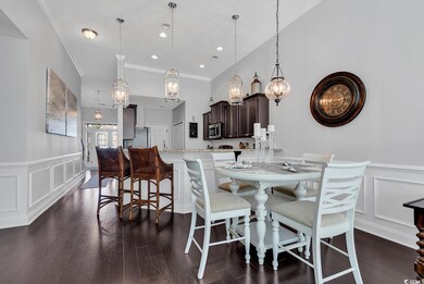 Dining room featuring dark hardwood / wood-style f