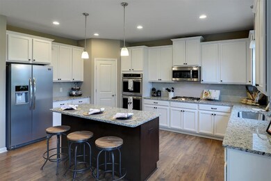 The large corner pantry makes this kitchen complet