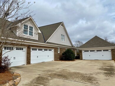 Attached 3 car garage/detached 2 car garage