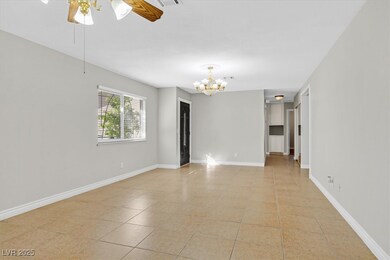 Unfurnished room with light tile patterned floorin