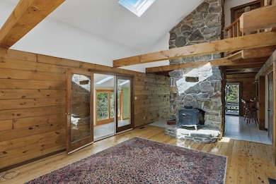 Field Stone Fireplace with Woodstove Insert