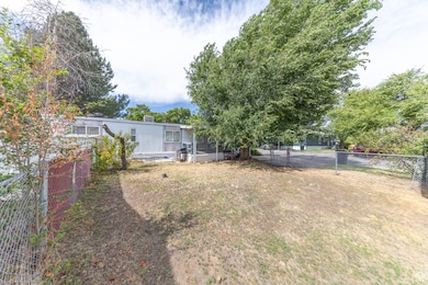 View of yard with a sunroom