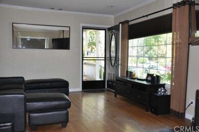 Living Room w/Hardwood Flooring & Fireplace