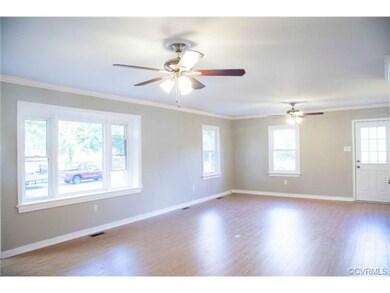 Family room, open floor plan, new laminate floorin