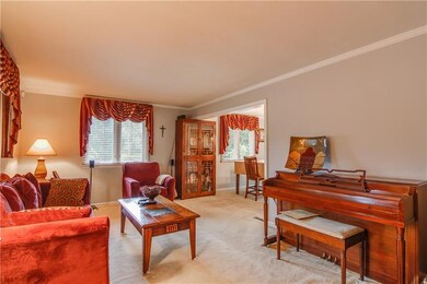 The living room opens to the spacious dining room.