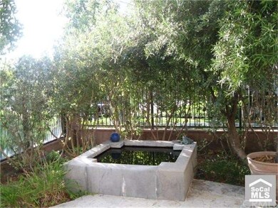 Fountain in backyard patio.