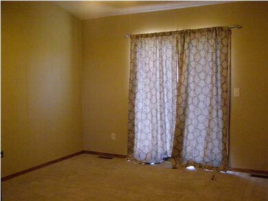 Master bedroom with sliding door out to the deck