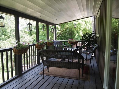 Relax on this inviting covered deck