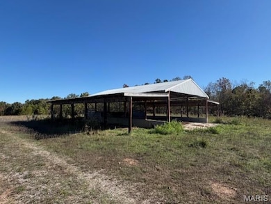 Stable featuring a view of rural / pastoral area
